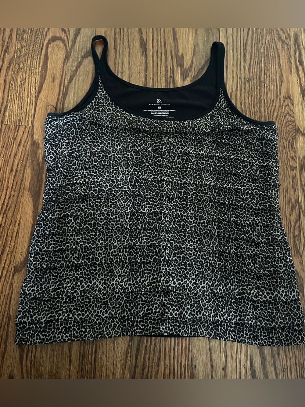 New York & Co black and white leopard print tank top.